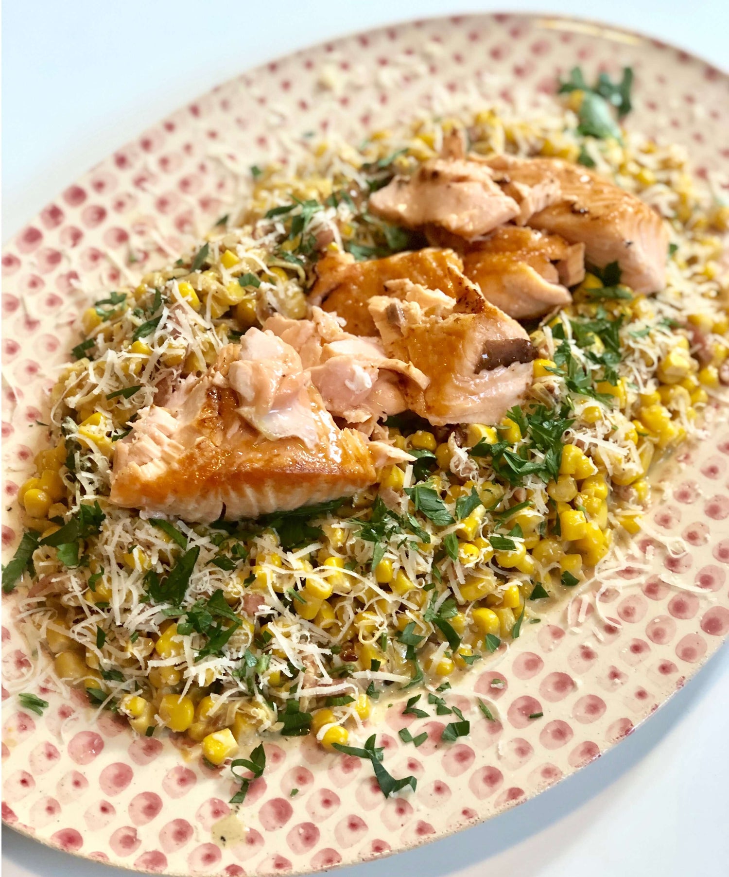 Creamy corn with coconut milk and salty roasted salmon