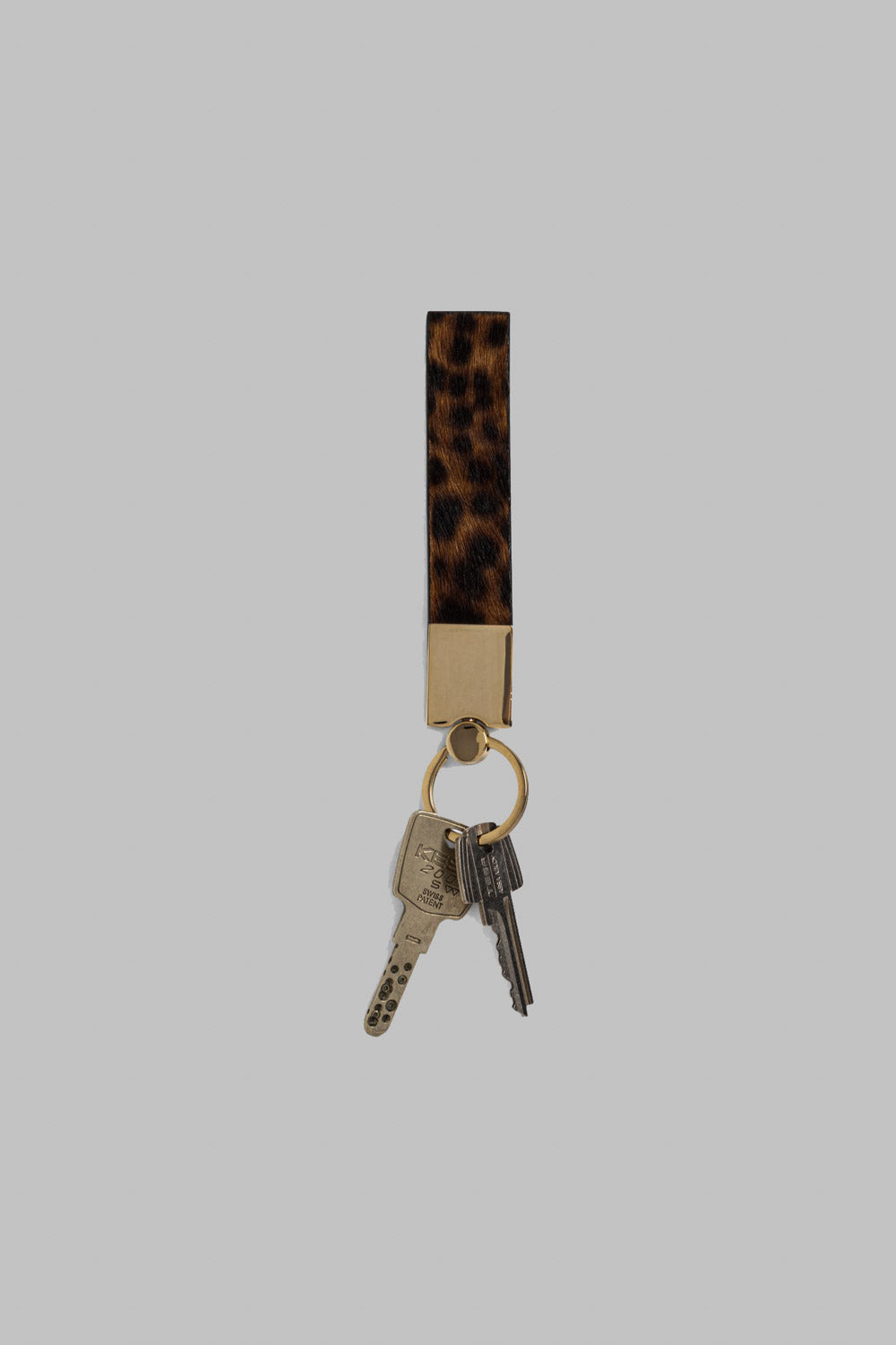 The Minis - Porte-clé Tirette en cuir imprimé léopard