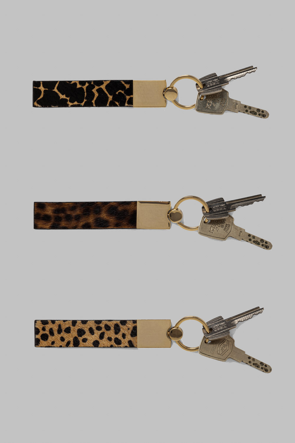 Les Minis - Porte-clé Tirette en cuir imprimé giraffe