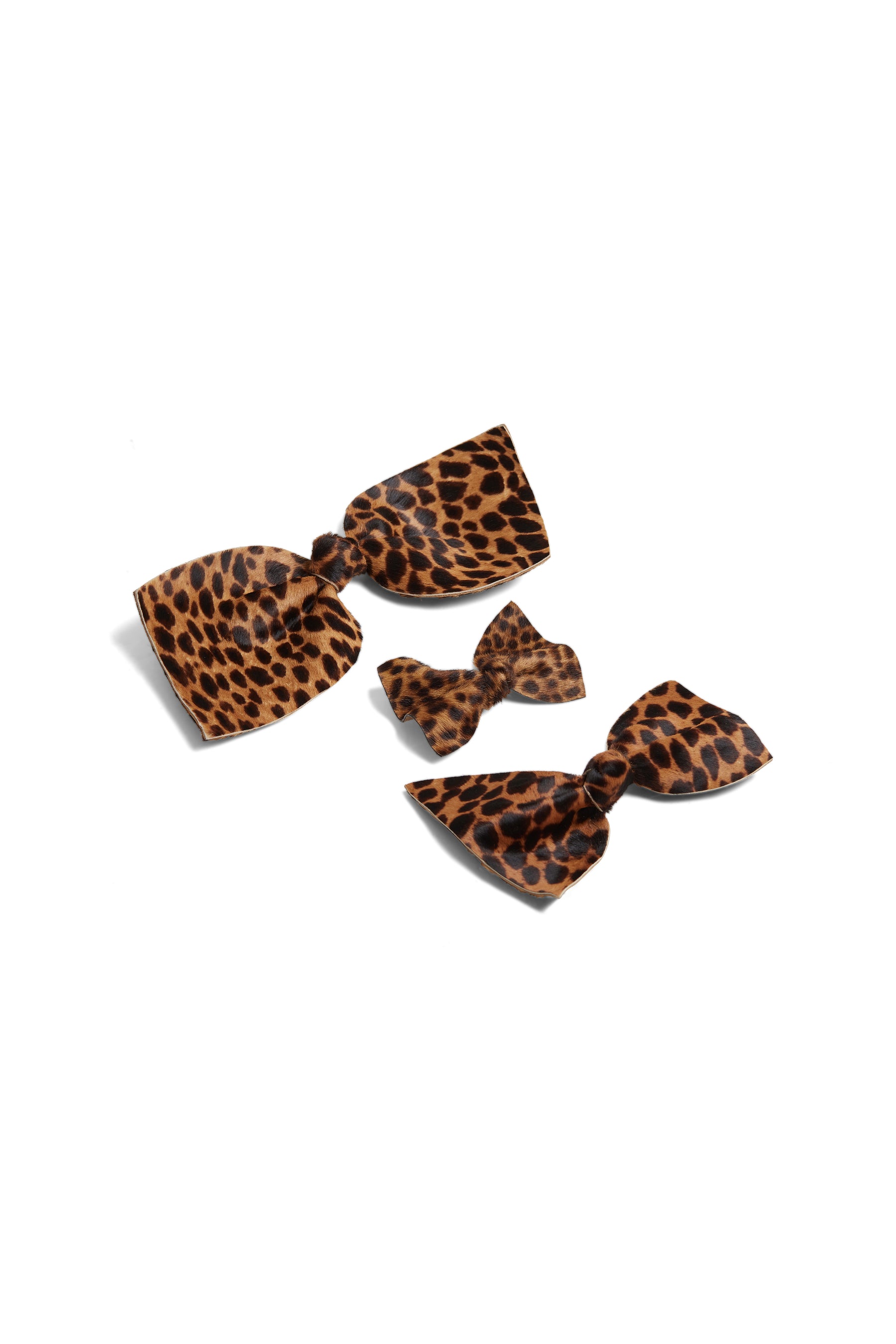 Petite barrette noeud en cuir léopard