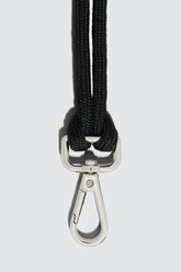 Silver and black phone strap