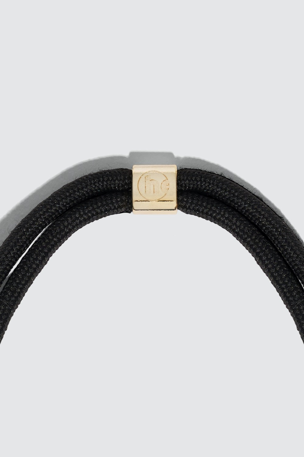 Gold and black phone strap